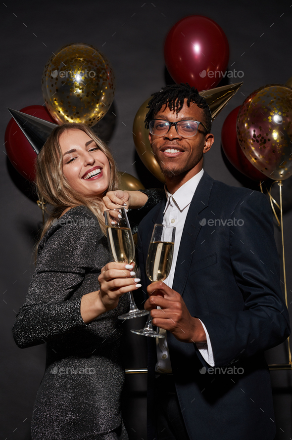 Beautiful Mixed-Race Couple Posing at Party - Stock Photo - Images