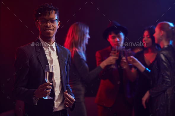 Elegant African Man Posing in Nightclub - Stock Photo - Images