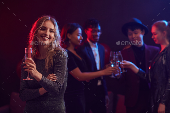 Beautiful Woman Posing in Nightclub - Stock Photo - Images