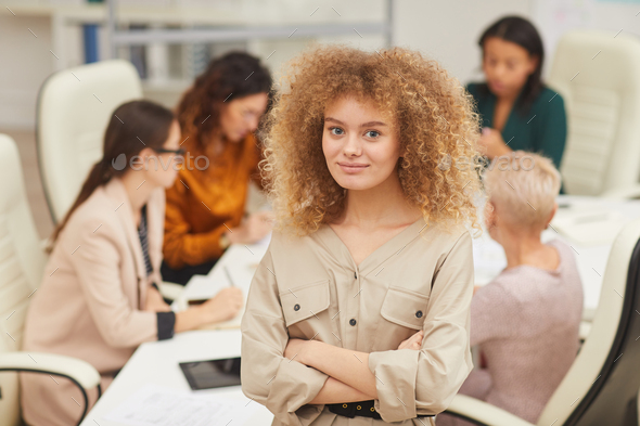 Charming Young Woman With Arms Crossed - Stock Photo - Images