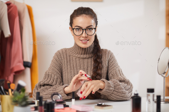 Beauty Blogger Testing Makeup on Camera - Stock Photo - Images