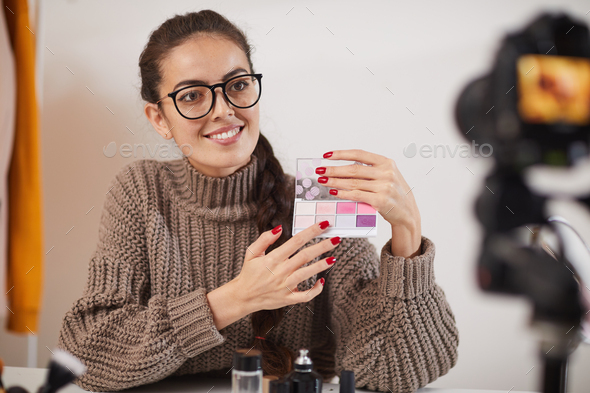Young Woman Filming Make Up Review - Stock Photo - Images