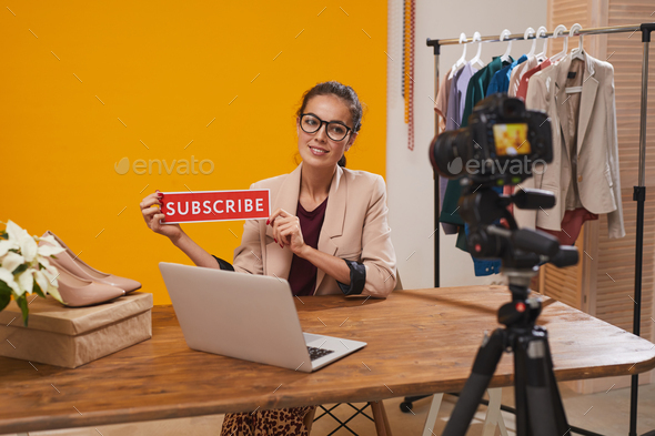 Fashio Blogger Holding Subscribe Button - Stock Photo - Images