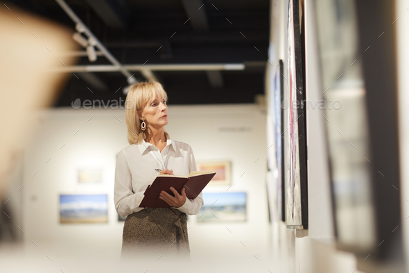 Art Gallery Manager at Work - Stock Photo - Images