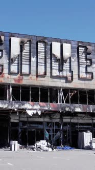 Vertical Video of a Bombed Shopping Center During the War in Bucha Ukraine alt