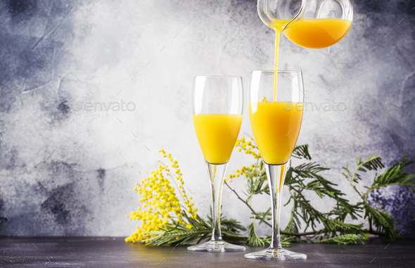 cocktail mimosa with orange juice - Stock Photo - Images