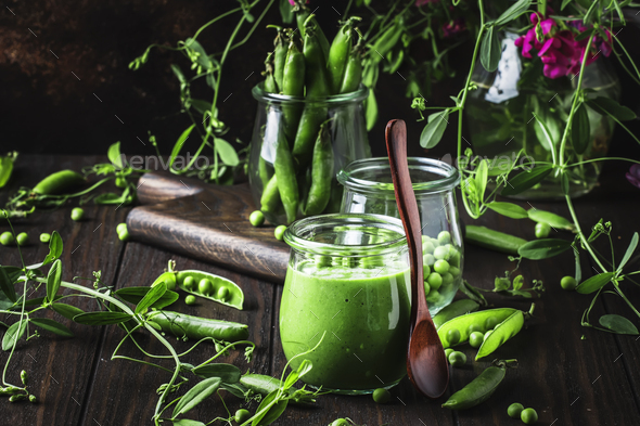 green peas in glass jar for making vegetable soup puree - Stock Photo - Images
