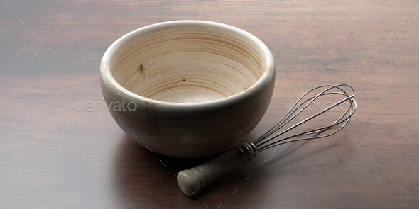 Wire whisk and mixing bowl against wood. 3d illustration - Stock Photo - Images
