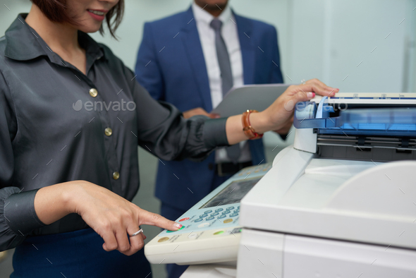 Office Assistant Using MF Printer - Stock Photo - Images