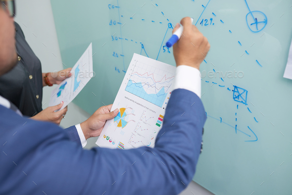 Managers Drawing Business Graph - Stock Photo - Images