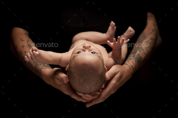 Hands of Father and Mother Hold Newborn Baby on Black - Stock Photo - Images