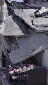 Vertical Video of a Destroyed House During the War in Ukraine alt