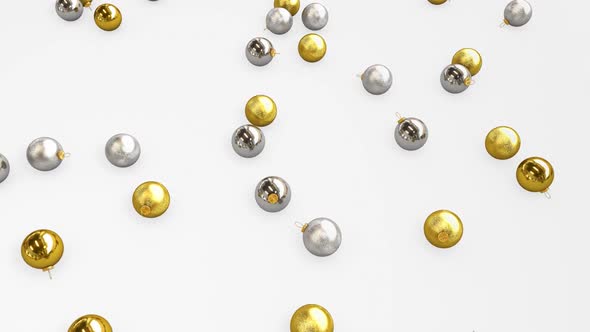 Gold And Silver Christmas Balls Fall On The Floor