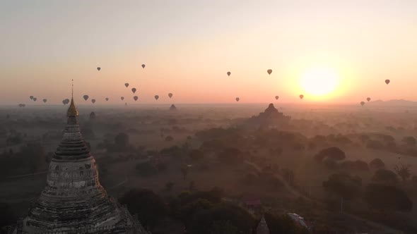 Aerial view of hot balloons in the Old Bagan temple site. alt