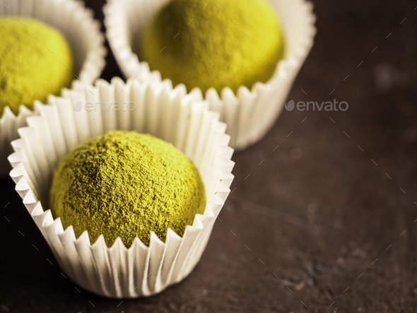 Homemade truffles with matcha tea powder,copyspace - Stock Photo - Images