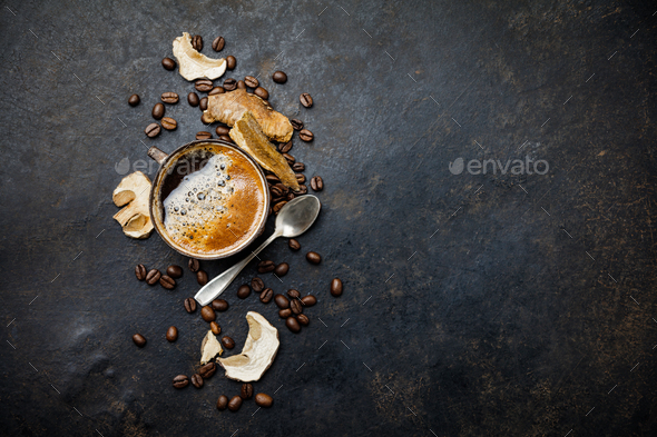 Mushroom Chaga Coffee Superfood Trend-dry and fresh mushrooms and coffee beans on dark background