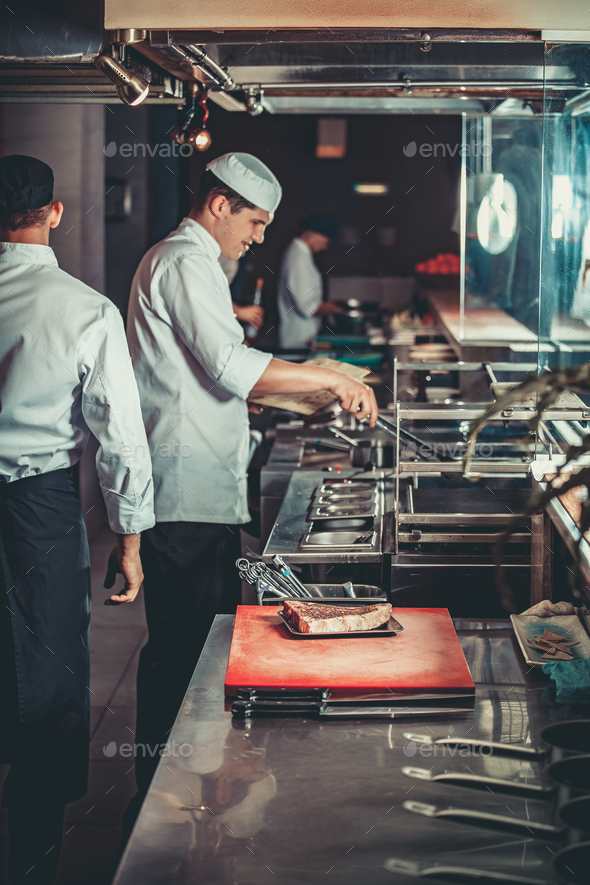 Preparing traditional beef steak - Stock Photo - Images