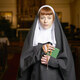 nun in church with rosary and bible - PhotoDune Item for Sale