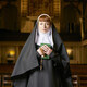 nun in church with rosary and bible - PhotoDune Item for Sale