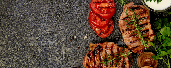 Banner with Steak pork grill with a variety of grilled vegetables