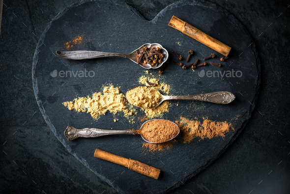 Spices for Christmas Gingerbread Cookies in Spoons - Stock Photo - Images