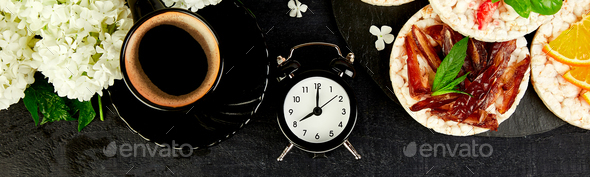 Banner with Alarm clock have a good day with a cup of coffee.