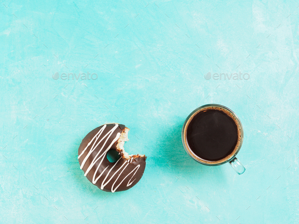 donuts on blue background , copy space, top view - Stock Photo - Images