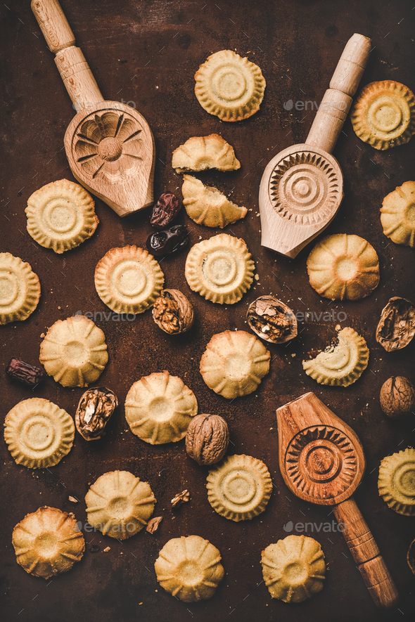 Flat-lay of Turkish traditional Hatay semolina cookies with walnut filling - Stock Photo - Images