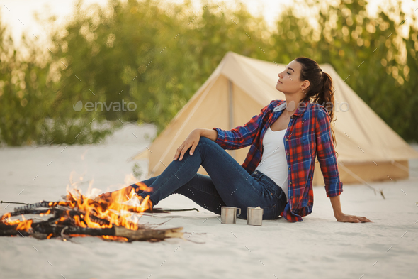 Tourist Woman in the Camp Near Campfire - Stock Photo - Images