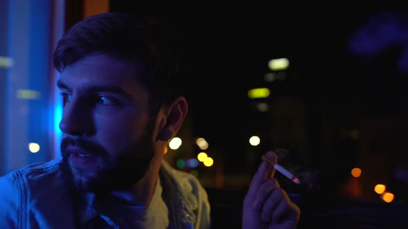 Depressed Man Nervously Smoking Near Window at Night, Life Decision, Problems alt