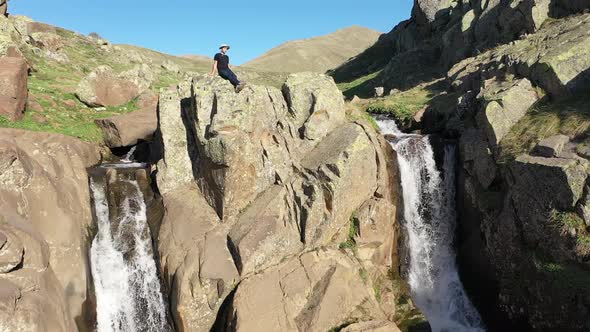 Man Relaxing In Nature Waterfall alt