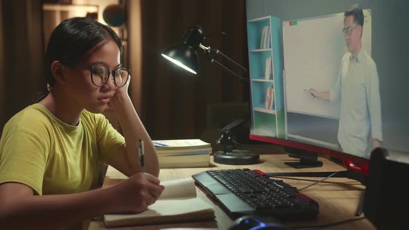Bored Asian Girl Student Distance Learning With Online Teacher On ...