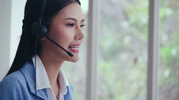 Customer Support Agent or Call Center with Headset Talking to Customer on Phone alt