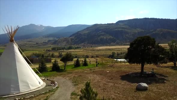 Drone shot over Tipi Hotel in Montana next to Yellowstone River alt