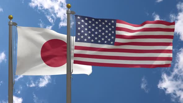 Japan Flag Vs United States Of America Flag On Flagpole alt