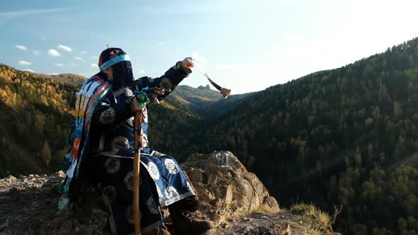 Shaman in a Trance on Top of a Mountain. alt