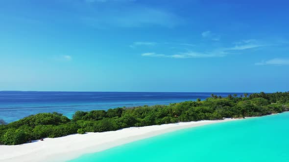 Aerial top down abstract of idyllic island beach break by blue green ocean with white sandy backgrou alt