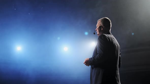Showman, Middle Age Male Entertainer, Presenter or Actor on Stage, Arms To Sides, Smoke on alt