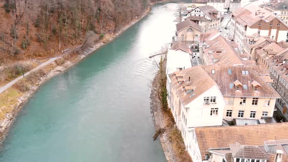 Fly over Aare River, aerial view of Bern Old City. Tourism in Switzerland alt