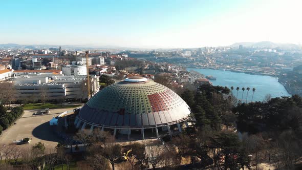 Palacio de Cristal, Crystal Palace, by the Douro River, Oporto, Portugal. Aerial forward alt