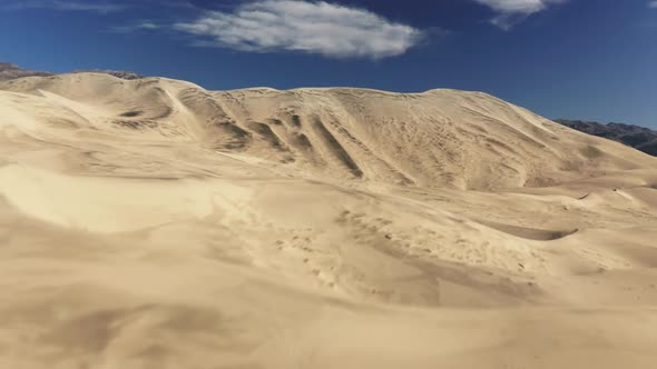 Aerial Establishing Drone Flying Fast Above Sand Dune with Desert Wilderness alt