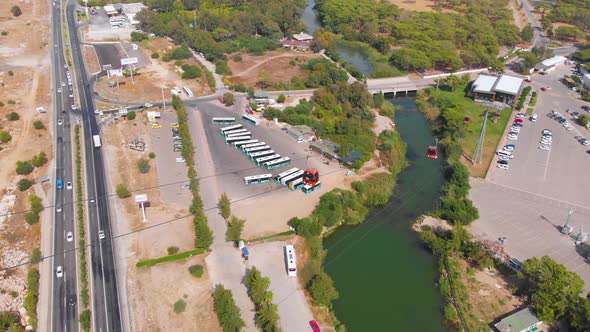 Close-up Flight Next To the Uphill Funicular with the Coast in the Background  alt