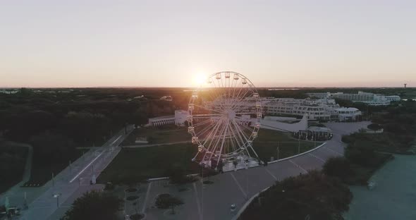 Aerial View of La GrandeMotte South of France Ferris Wheel in the Morning alt