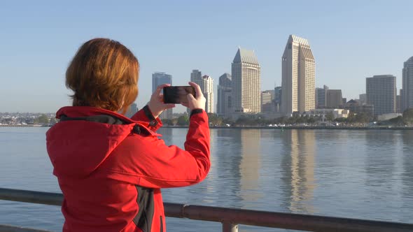 Woman Traveler Use Phone Taking Street Panoramic Photo alt