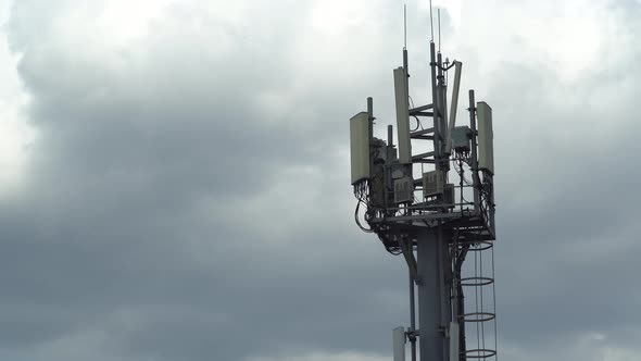 mobile communications tower against the sky. time lapse alt