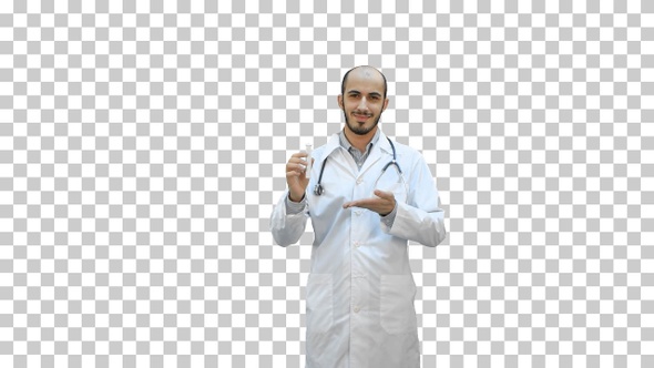 Smiling doctor in uniform pointing at, Alpha Channel