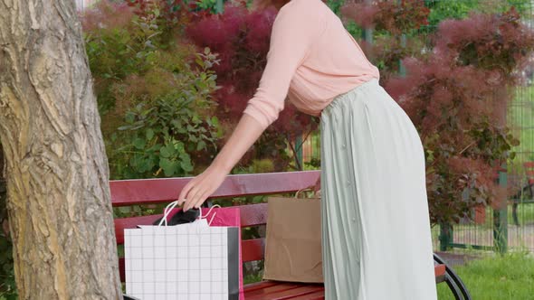 Attractive Woman with Shopping Bags