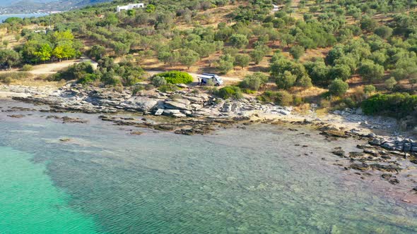 Motorhome Van on the Mediterranean Sea Greek Coast. Aerial Footage of Scenic Sea. alt