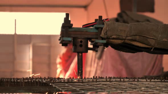 Arm Of Spot Welding Machine Being Used Inside Factory In Karachi, Pakistan alt