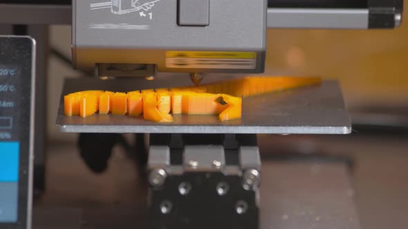 Closeup Threedimensinal Printer is Creating a New Figure in Real Time alt